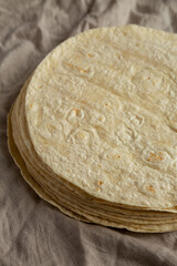 Homemade Wheat Flour Tortillas in a Stack, side view.