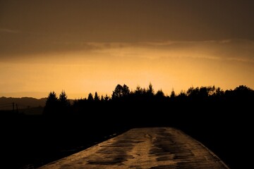 Fototapeta Zachód słońca w deszczu. obraz
