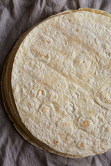 Homemade Wheat Flour Tortillas in a Stack, top view. Flat lay, overhead, from above.
