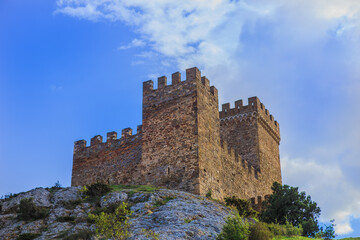 Fototapeta na wymiar Ancient stone fortress on a high hill