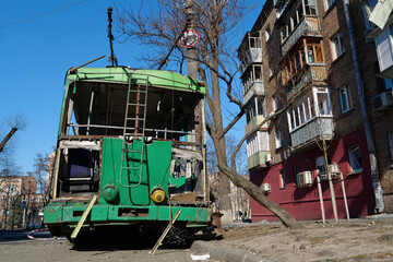 Russian missile destroyed green trolleybus and houses in center of Kyiv, Ukraine