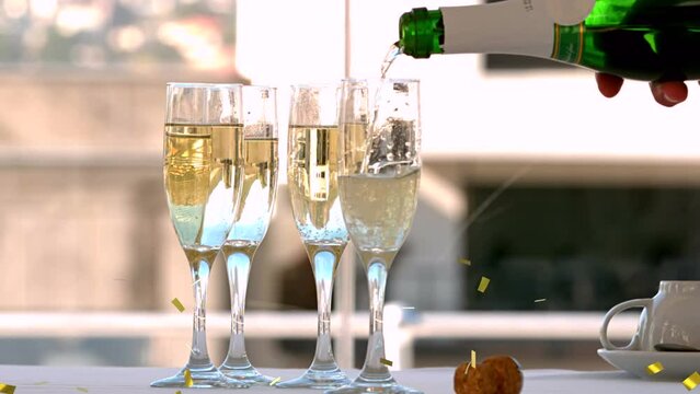 Animation of confetti over glasses of champagne