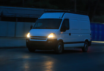 Mini bus moves at night