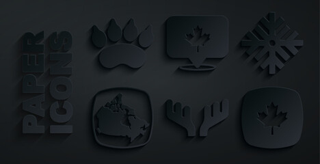 Set Deer antlers, Snowflake, Canada map, Canadian maple leaf, and Bear paw footprint icon. Vector