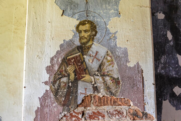 frescoes on the walls of an abandoned temple