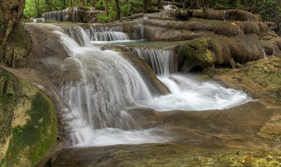 Fototapeta na wymiar Beautiful deep forest waterfall in Thailand