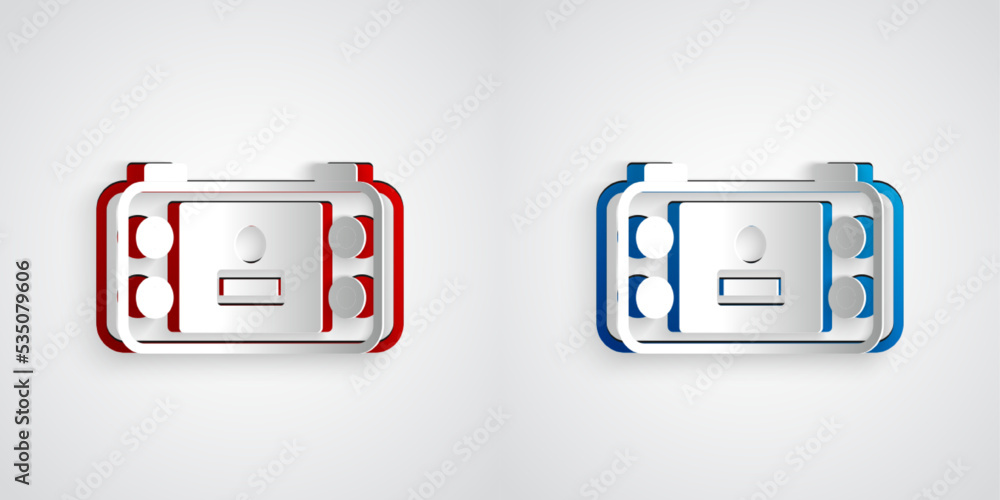 Poster paper cut portable video game console icon isolated on grey background. handheld console gaming. pap