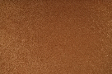 Fototapeta premium Texture background of velours brown fabric. Fabric texture of upholstery furniture textile material, design interior, wall decor. Fabric texture close up, backdrop, wallpaper.