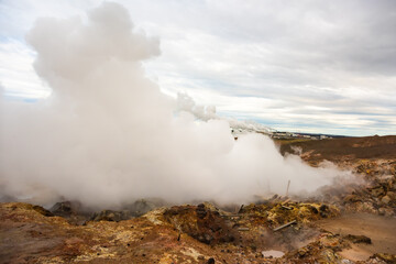 Fototapeta na wymiar Gunnuhver Hot Springs spectacular landscape with steam from geothermal hot springs in Iceland, Reykjanes