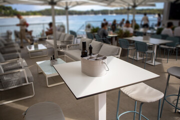 empty seaside restaurant table during summer