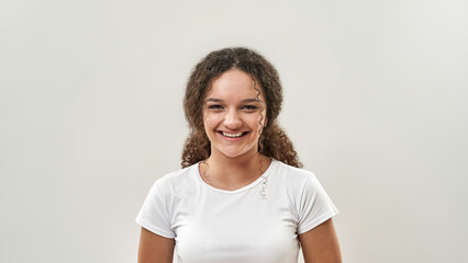 Portrait of smiling teenage girl looking at camera
