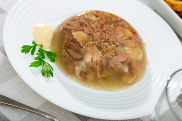 Bowl of pork aspic, meat jelly, popular appetizer in western Europe
