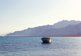 Fishing boat by the sea