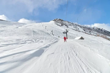 Fotobehang Ski lift pulling © Gudellaphoto
