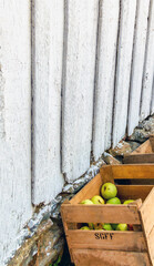 apples in a wooden crate
