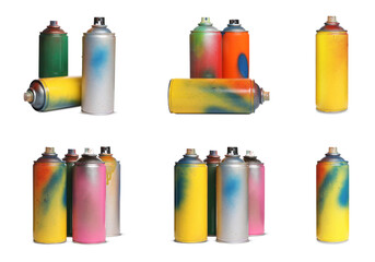 Set with used cans of spray paints on white background