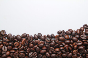 Coffee beans border isolated on white background with copy space