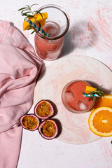 Pink colored juice made with purple passion fruit