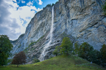 landscape in the mountains with waterfall