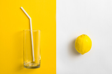 Lemon and glass flat lay health & nutrition concept image with copy space for text.