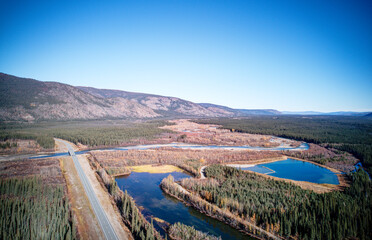 Fototapeta na wymiar Fall aerial photo of the road from Tok Alaska.