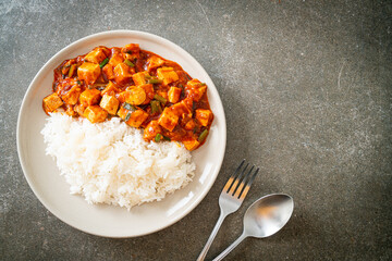 Mapo Tofu - The traditional Sichuan dish of silken tofu and ground beef, packed with mala flavor from chili oil and Sichuan peppercorns.