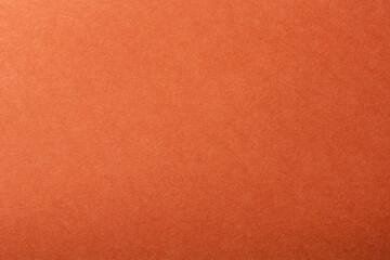 質感のあるオレンジ色の紙の背景テクスチャー
