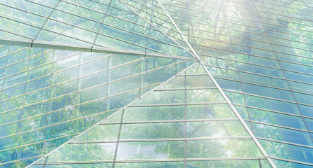 Sustainble green building. Eco-friendly building. Sustainable glass office building with tree for...