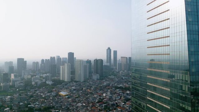 Skyscraper window with urban building background