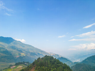 Aerial view of golden rice terraces at Mu cang chai town near Sapa city, north of Vietnam. Beautiful terraced rice field in harvest season in Yen Bai, Vietnam
