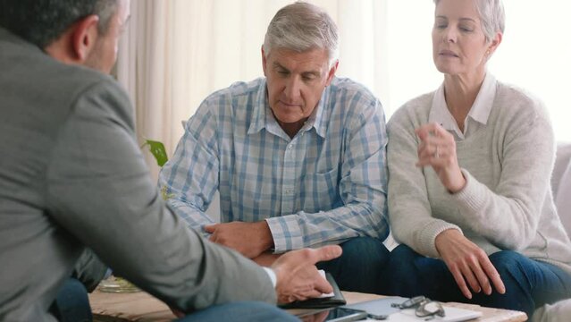 Senior couple, financial advisor and clients talking insurance, savings and investment contract with lawyer. Man and woman sitting together and consulting with a banker or realtor for advice and help