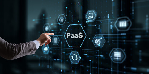 Hand pressing button on interface PaaS, Platform as a Service. Internet and networking concept