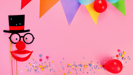 Funny faces on party pink background.