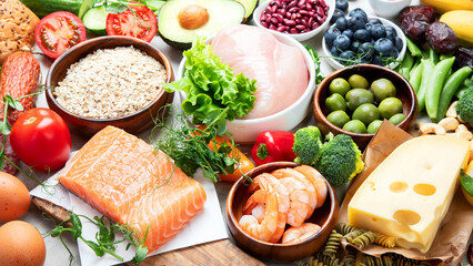 Healthy food assortment on light background.