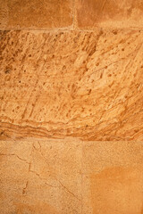 Sunlit marble slab vertical background, idea for wallpaper, building decor or screen