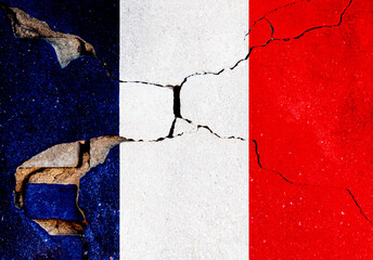 France flag on cracked concrete wall