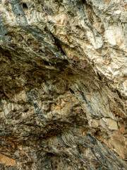 rock climbing route with cables and carabiner