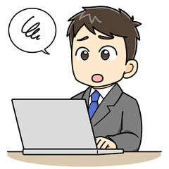 パソコンの前で悩むビジネスマン