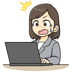 パソコンの前で驚くビジネスウーマン