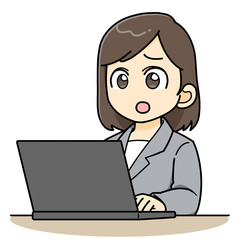 パソコンの前で浮かない表情をするビジネスウーマン