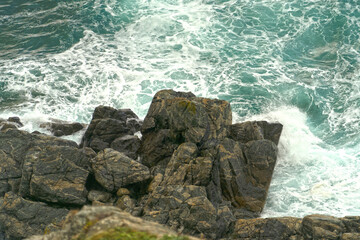 landscape with steep cliffs by the sea