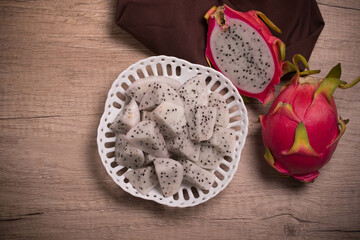 Sliced dragon fruit in a white plate