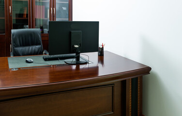 Modern workspace with computer and chair