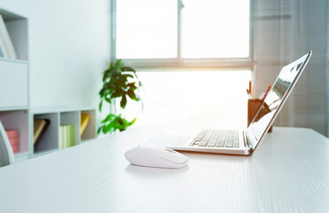 Modern workspace with computer and chair