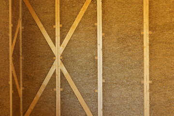 Close-up of detail at construction of ecological renewable low energy sustainable wooden eco house.