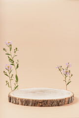 Wooden podium with flowers on beige background. Concept scene stage showcase, product, promotion...