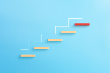 Wooden blocks stacking as step stair, Ladder of success in business growth concept