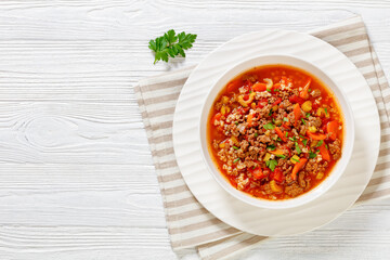 Hamburger Soup with barley and vegetables in bowl