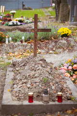 graves on cemetery during All Saints Day