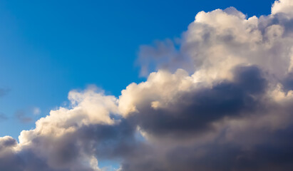 Clouds in dramatic blue sky.